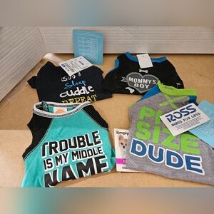 4 Xtra Small Dog Tshirts. NWT (C)